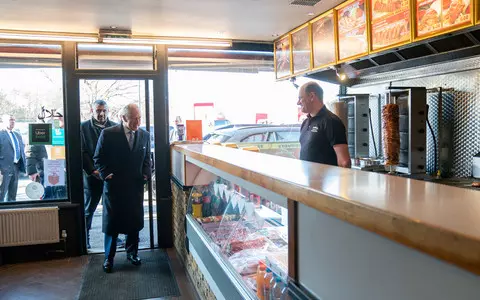 King Charles visits Hounslow kebab shop as Queen Camilla forced to pull out