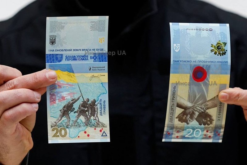 Ukraine unveils new banknote on anniversary of war, with slogan "we remember and will not forgive"
