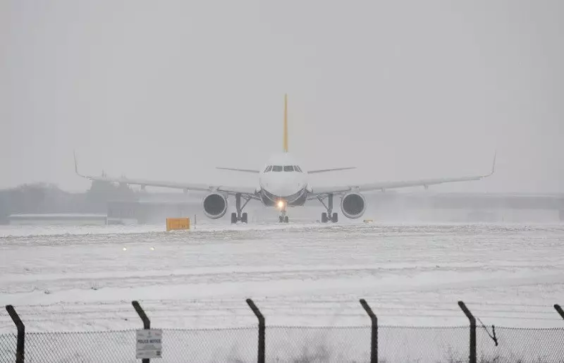 London airports thrown into snow chaos with flights held at Heathrow, Gatwick and City