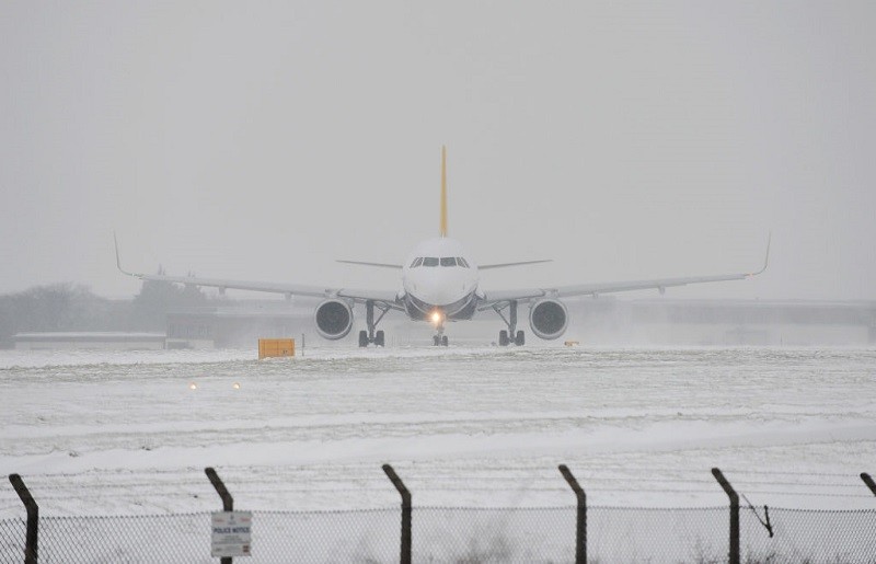 London airports thrown into snow chaos with flights held at Heathrow, Gatwick and City