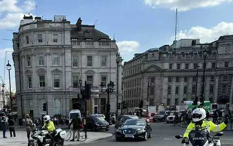 An 81-year-old British woman has died after being hit by a motorcycle of the royal escort