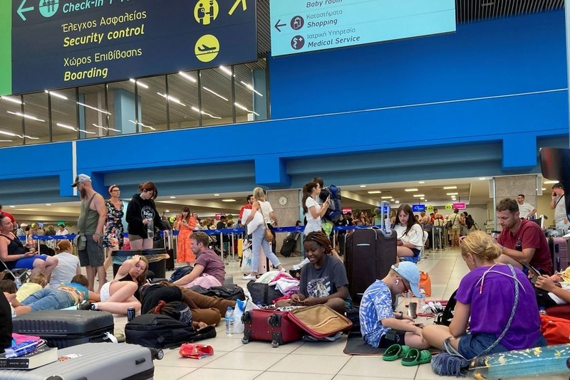 Poles have been camped at the airport in Rhodes for a day and do not know when they will return