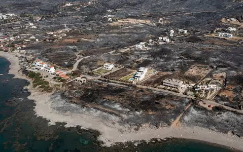 Greece's PM promised free stay in Rhodes to tourists who had to flee due to fires