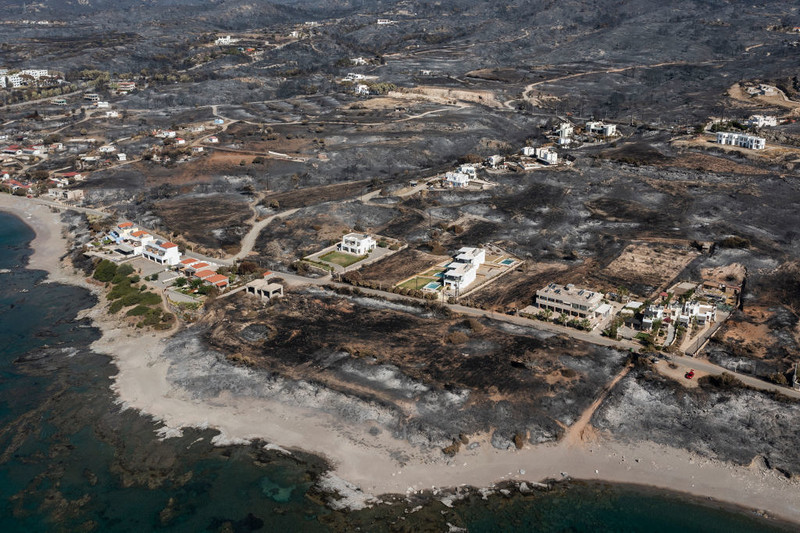 Greece's PM promised free stay in Rhodes to tourists who had to flee due to fires