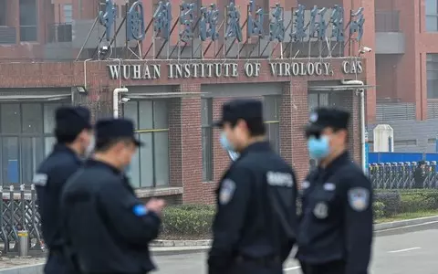 CIA whistleblower claims agency 'BRIBED' their own analysts to say COVID did NOT come from Wuhan