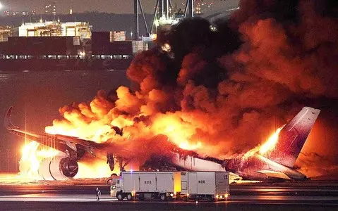 Collision at Tokyo airport. Passengers evacuated from burning plane, 5 people dead