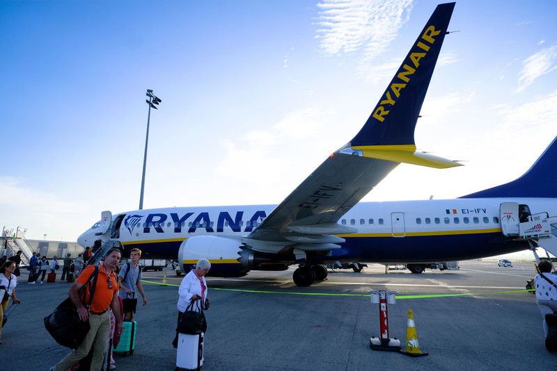 Ryanair cuts profit forecast after online travel agent row