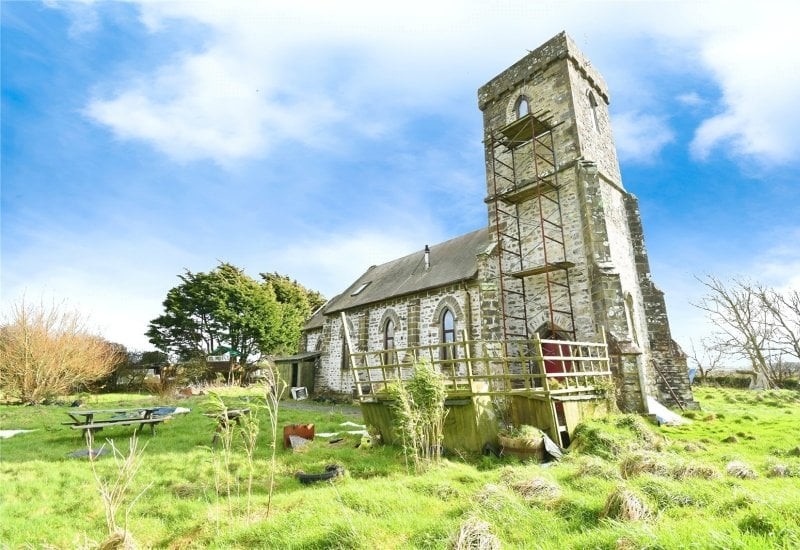 Converted church on sale for just £5k more than parking space in London
