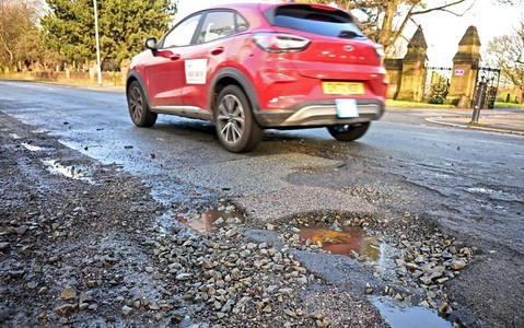 Potholes: Roads in England and Wales at 'breaking point'