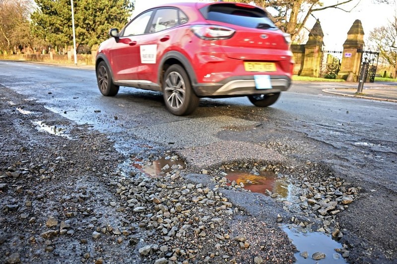 Potholes: Roads in England and Wales at 'breaking point'