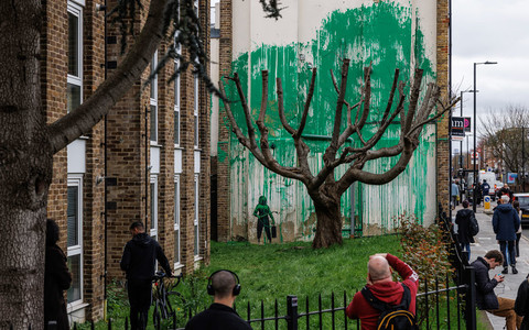 Owner of Banksy mural flats says he won't to put up rent - but could be tempted to sell