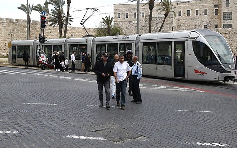 Jerusalem stabbing: British woman killed in tram attack