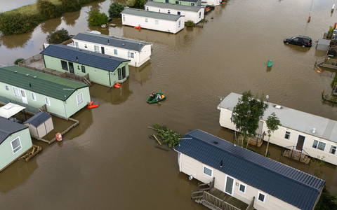 Roads and train lines flooded after more downpours