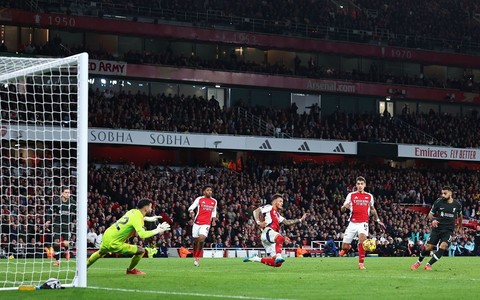 Liverpool come from behind twice to draw at Arsenal