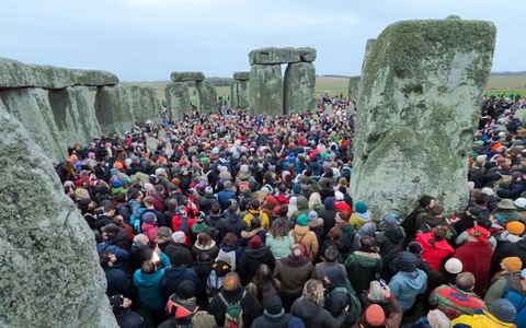 Thousands gather at Stonehenge to celebrate the winter solstice