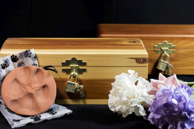 In Milan, a pet can be buried in its owner's grave