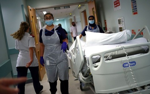 Hospital patients dying undiscovered in corridors, report on NHS reveals