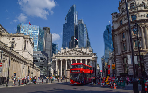 Bank of England cuts interest rates to 4.5% and halves UK growth forecast