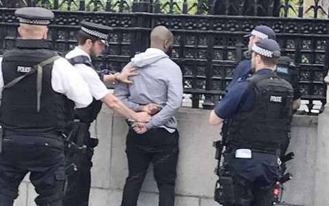 Man armed with knife held at gunpoint outside parliament