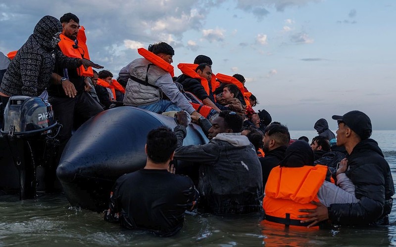 106 migrants cross Channel in one boat marking largest single load ever to arrive in Britain