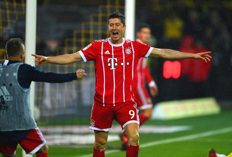 Bayern ease past Dortmund to extend Bundesliga lead