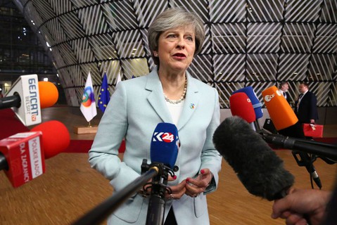 May calls on EU to move with Britain to open Brexit trade talks