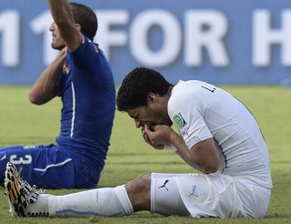 England's nemesis Luis Suárez  faces two-year ban after being charged by Fifa with biting an Italian
