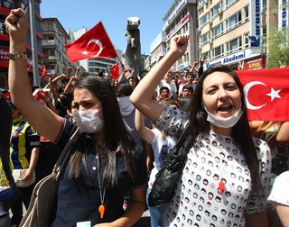 Women should not laugh in public, Turkish deputy PM says