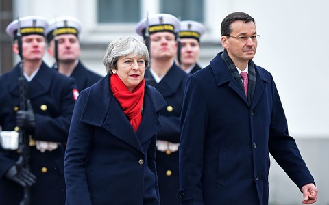 Theresa May plans new defence treaty on visit to Poland