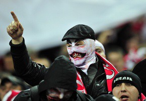 Flares, masks and lots of noise... 20,000 Polish fans invade Wembley 