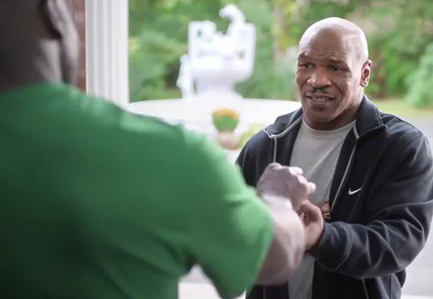 Mike Tyson finally gives Evander Holyfield his ear back in new TV ad