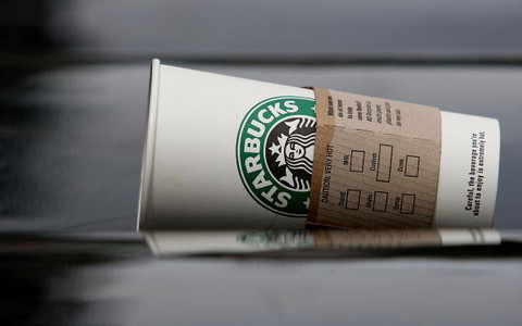 Starbucks trials 5p takeaway cup charge in attempt to cut waste