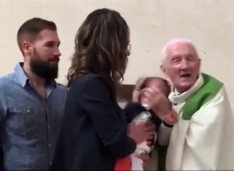 French priest, 89, who slapped crying baby during his baptism forced to retire
